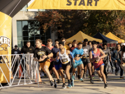Runners starting 5K race at UMBC.