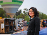 Bryan Li observing a crash between a vehicle and baloon